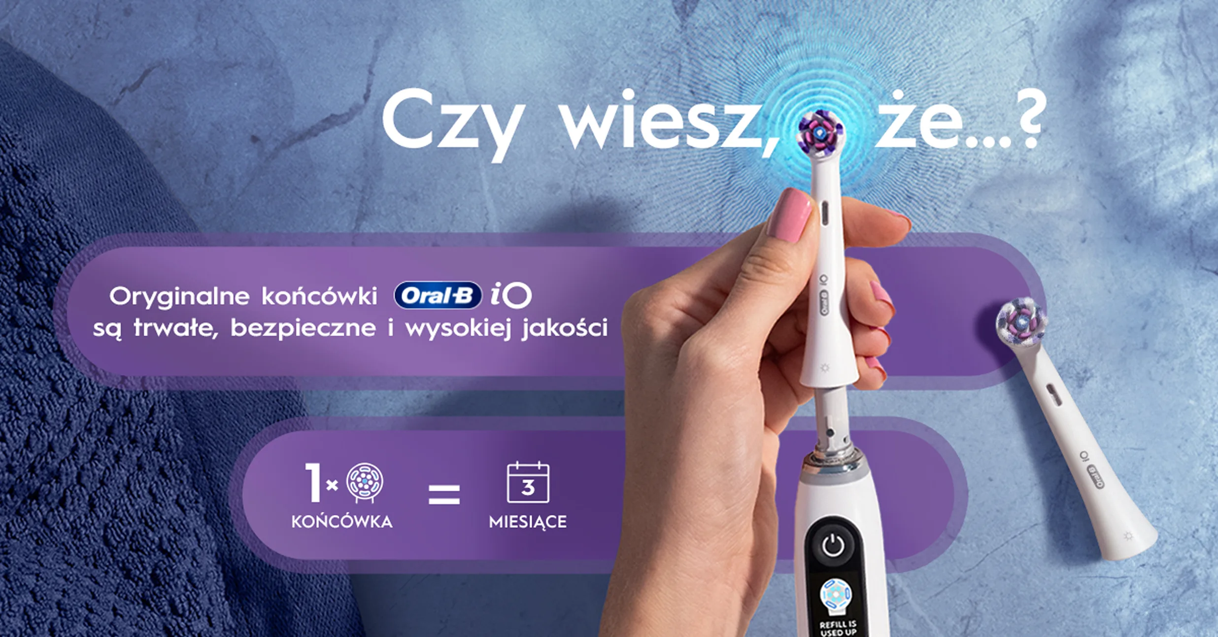 Dłoń trzymająca końcówkę szczoteczki Oral-B iO, którą można używać nawet przez 3 miesiące. 