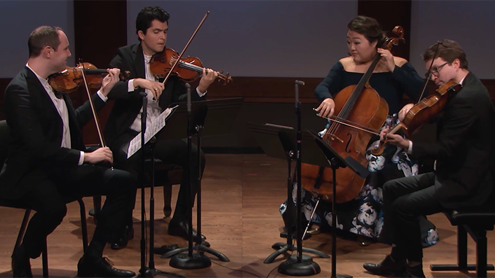 Chamber music ensemble is performing a song in a live stream