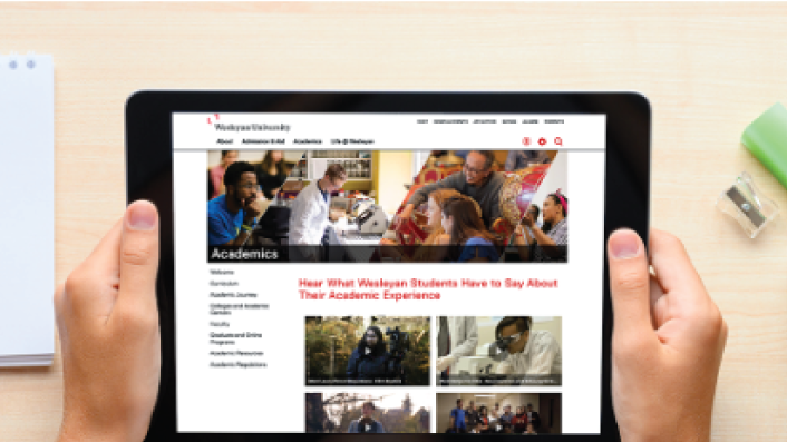 Wesleyan University customer story banner image of a person interacting with video content on a tablet