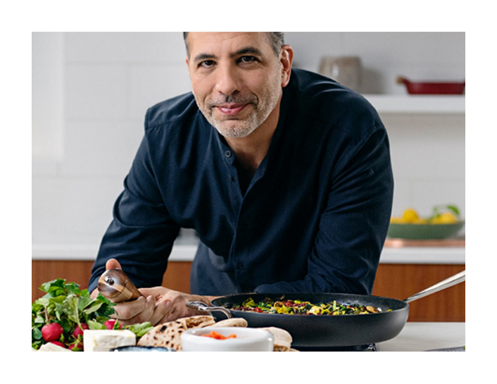 Mandar Bapaye of MasterClass posing in a kitchen
