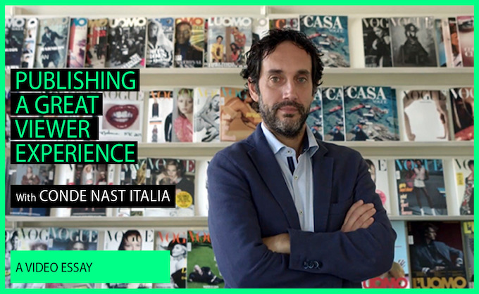 Video screenshot of Condé Nast Italia Digital CTO Marco Viganò posing in front of the company's print magazines.