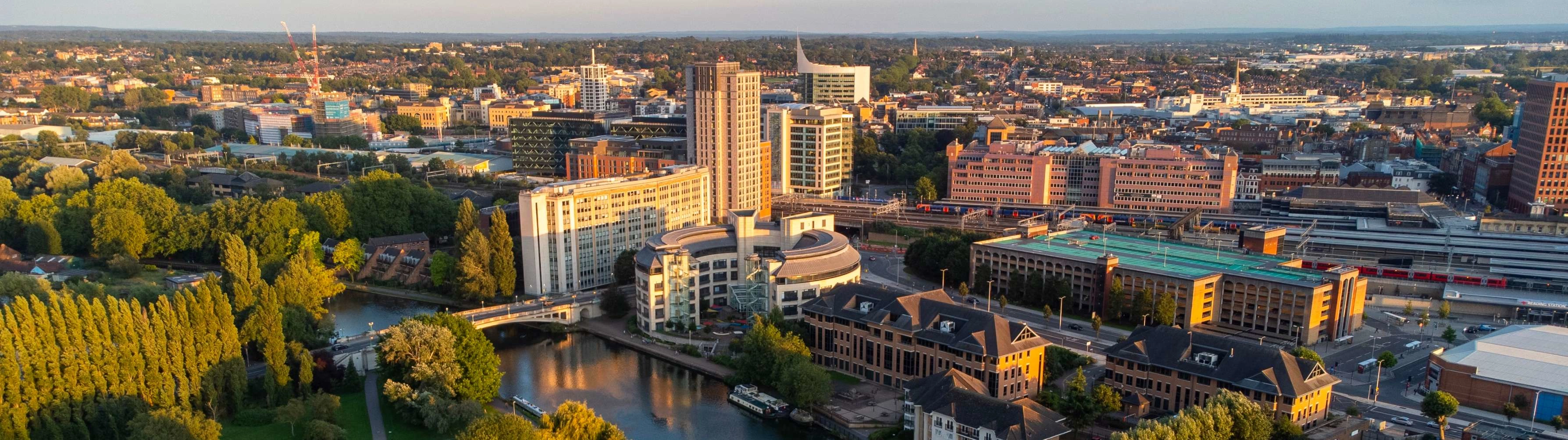 The city center of Reading in the soft light of evening or dusk.