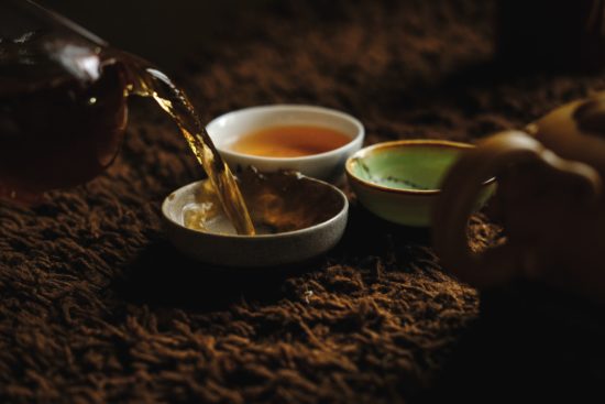 <figcaption class="wp-element-caption">A moment of peace and reflection: experiencing the ancient Japanese tea ceremony. <em>Image credit: Sergey Norkov/ Unsplash</em><br></figcaption>