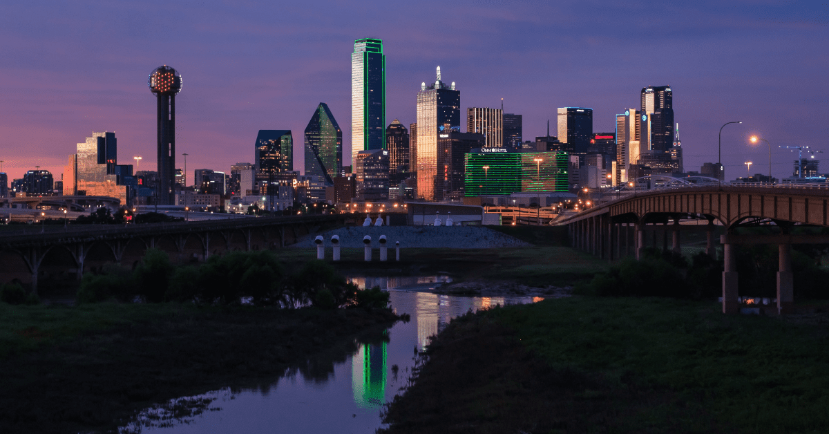 <figcaption>The Downtown Dallas skyline. <em>Image credit: Max Fray/Unsplash</em></figcaption>