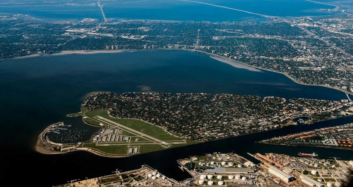 Tampa Florida aerial view with Peter O'Knight Airport and Howard Frankland Bridge and West Courtney Campbell Causeway in the distance.
