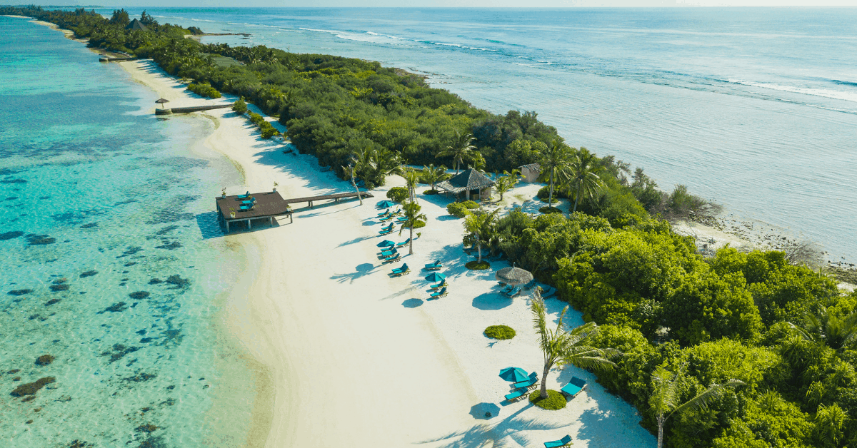 <figcaption>Aerial view of Herathera island, Maldives.<em> Image credit: mbbirdy/iStock</em></figcaption>