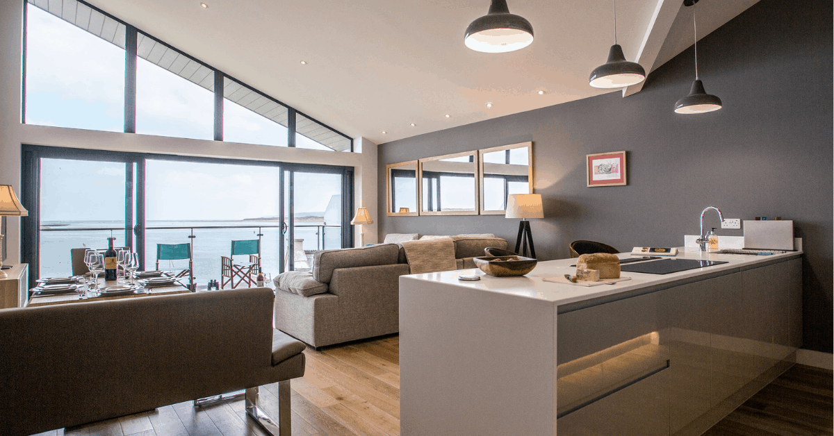 <figcaption>Harbour Lights view from the open-plan living space. Image credit: The front porch view at Fron Haul.<em> Image credit: Hoseasons</em></figcaption>