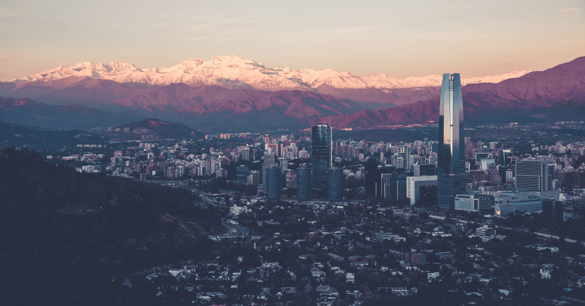 <figcaption class="wp-element-caption">Skyline of Santiago, Chile. <em>Image credit: Wikimedia</em></figcaption>