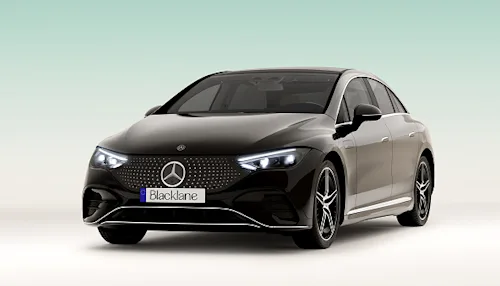 A sleek black Blacklane business class Mercedes EQS limo. 