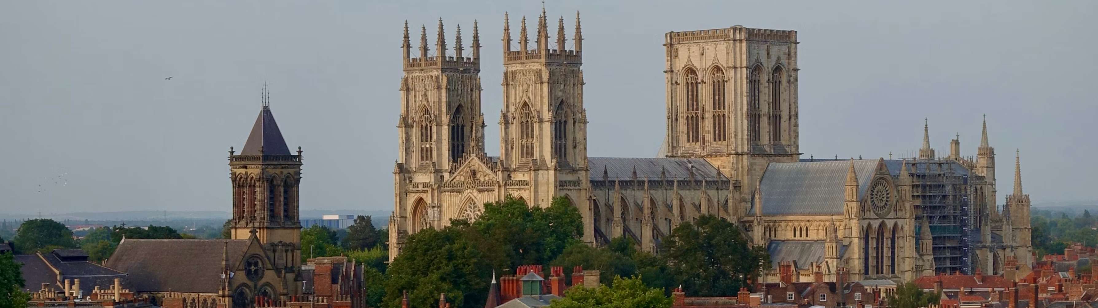 The world-famous York Minster building against an overcast sky in the historic city of York.