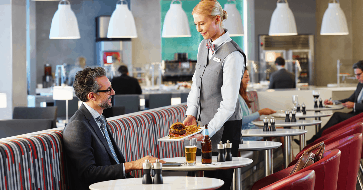 <figcaption>The Admirals Club lounge at JFK is one of the Club's most impressive.<em> Image credit: American Airlines</em></figcaption>