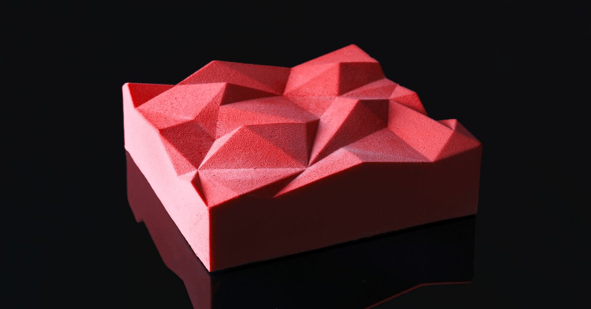 <figcaption>A geometric cake created with a 3D mold by Kasko. <em>Image credit: Supplied</em></figcaption>