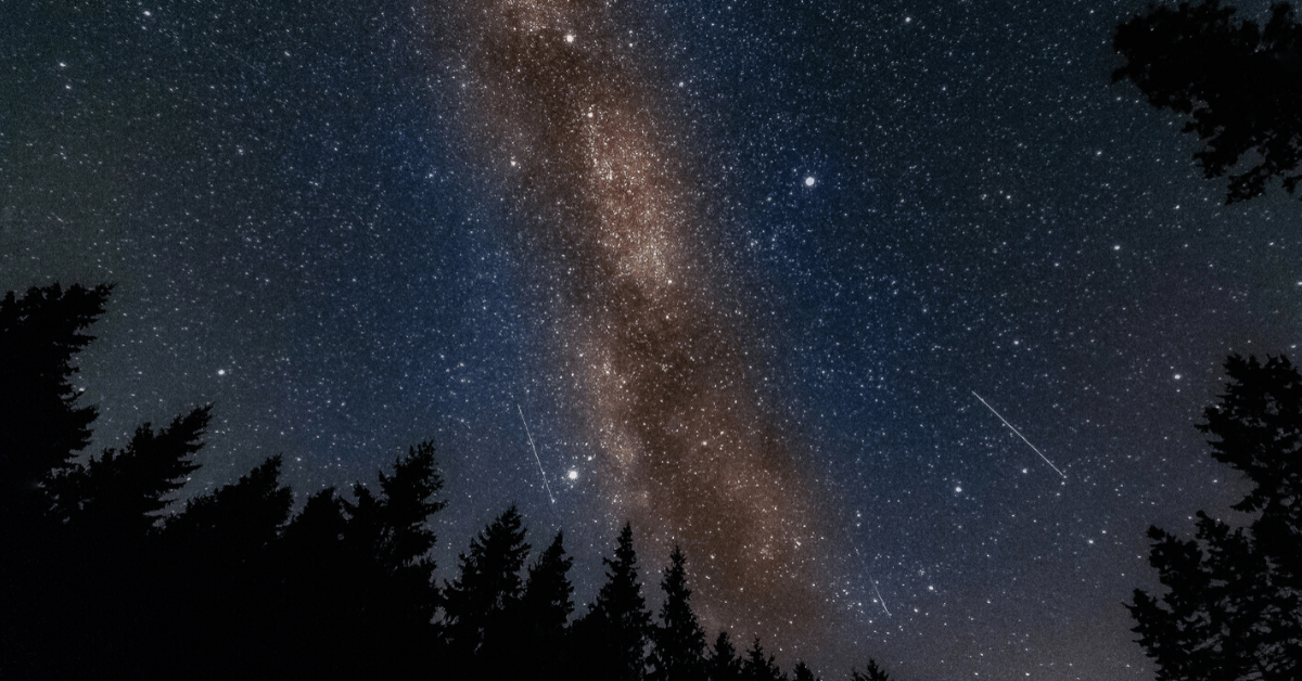 <figcaption>Milky way over Kielder Forest, Northumberland. <em>Image credit: Mark Bromham/iStock</em></figcaption>