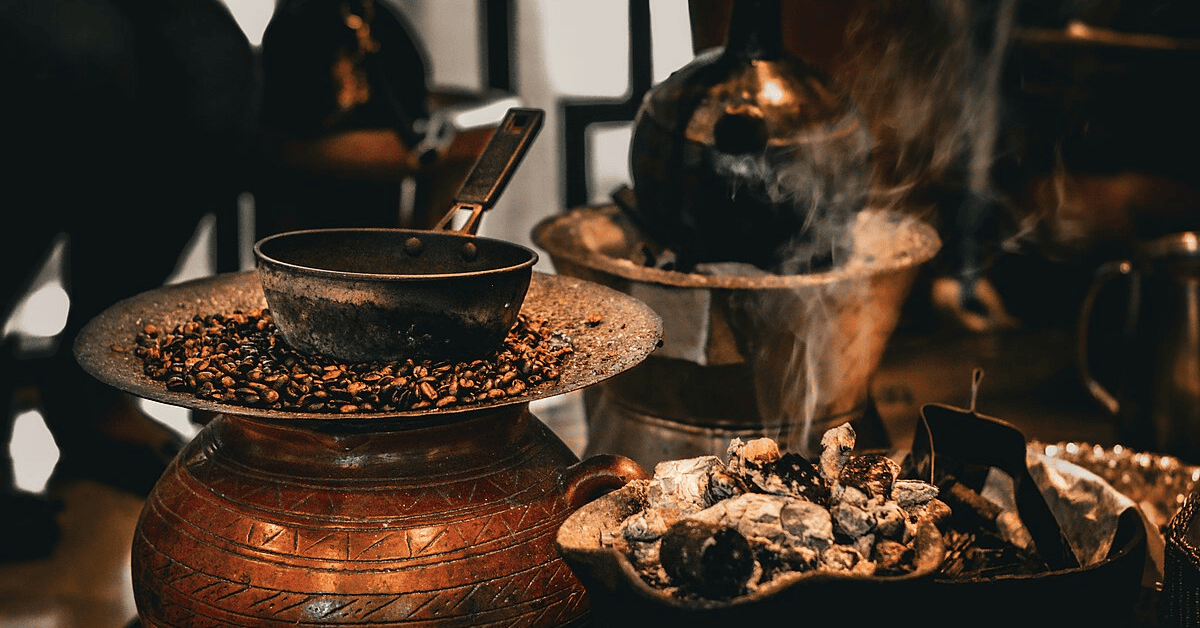 <figcaption class="wp-element-caption">Coffee ceremony in Ethiopia. <em>Image credit: Wikimedia</em></figcaption>