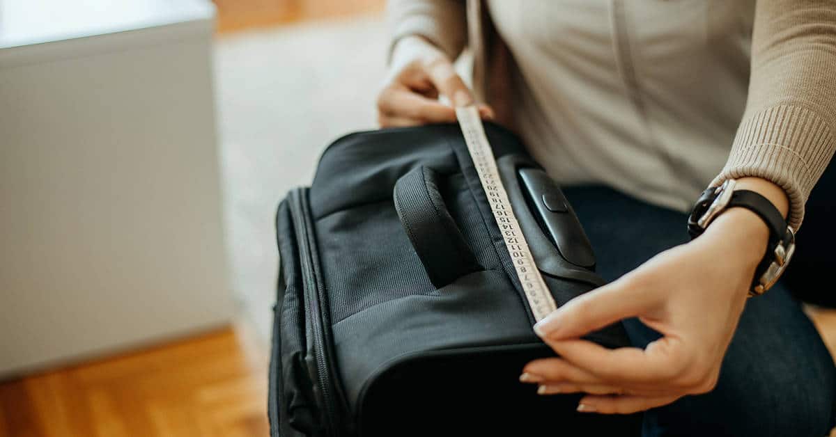 <figcaption>We recommend also checking in with your airline's carry-on baggage limits. <em>Image credit: nortonrsx/iStock</em></figcaption>