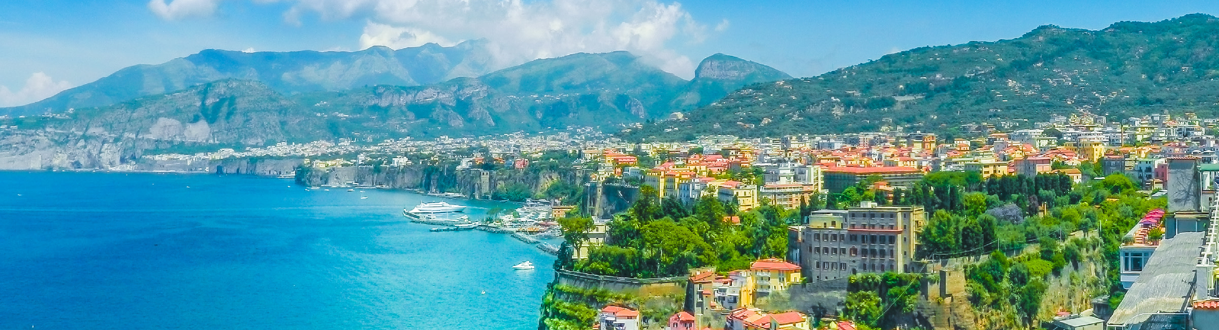 The beautiful coastal town of Sorrento on a clear summer's day. Clear blue ocean lies before beautiful, low-rise houses.