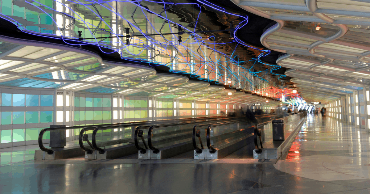 <figcaption class="wp-element-caption">The passenger tunnel at Chicago O'Hare Airport.<em> Image credit: aimintang/iStock</em></figcaption>