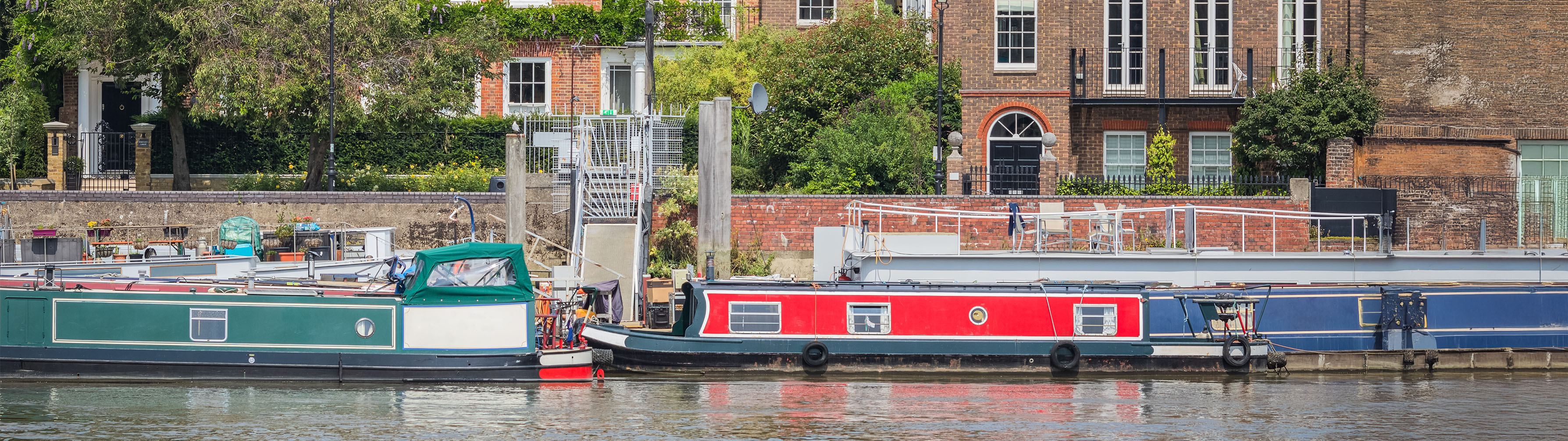 Boats moored on the riverside in Hammersmith, London