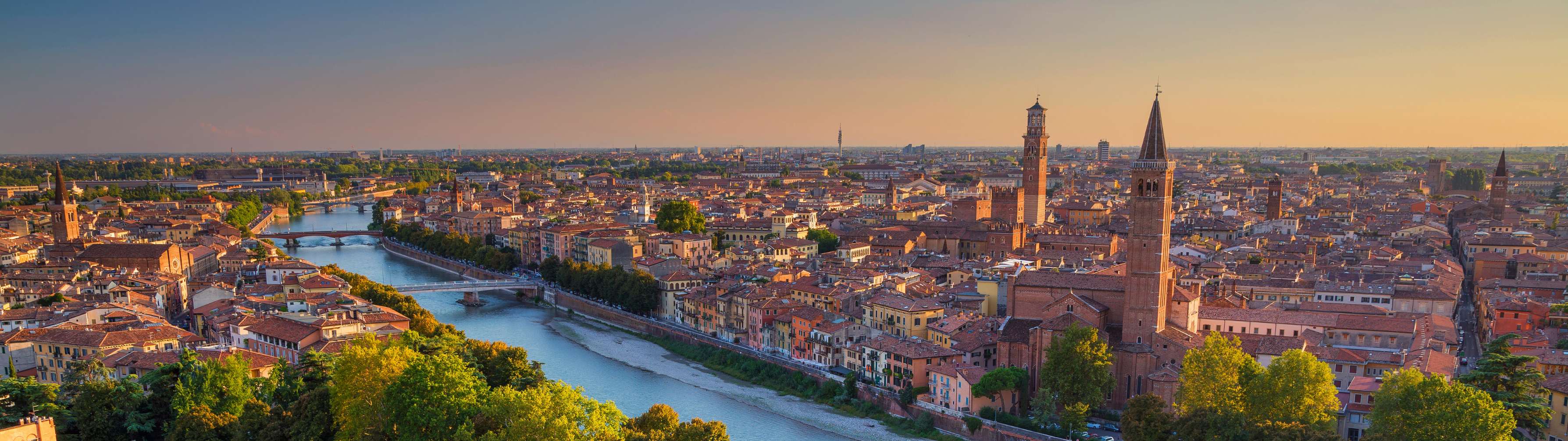 The beautiful city of Verona stretched out in the light of dusk or dawn.