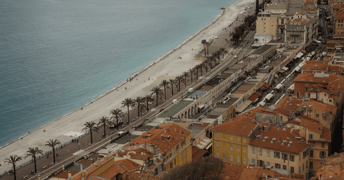 <figcaption class="wp-element-caption">The Promenade des Anglais is a promenade along the Mediterranean coast of Nice, France. <em>Image credit: Jovan Vasiljević/Unsplash</em></figcaption>