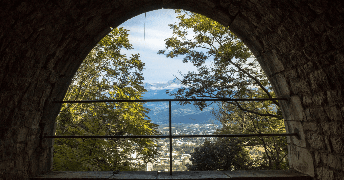 <figcaption class="wp-element-caption">A view out from Fort de La Bastille in Grenoble. <em>Image credit: Léo Thomas/Unsplash</em></figcaption>