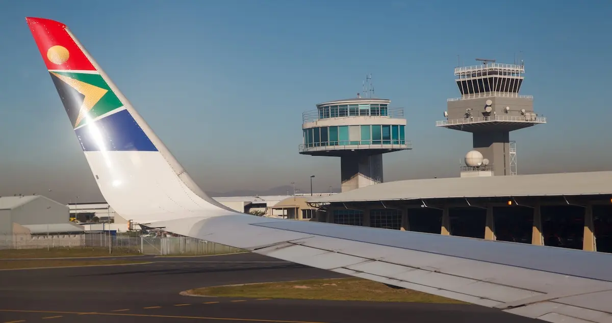 The Control Tower and Transmission towers as seen from a South African airplane in Cape Town International Airport, South Africa.