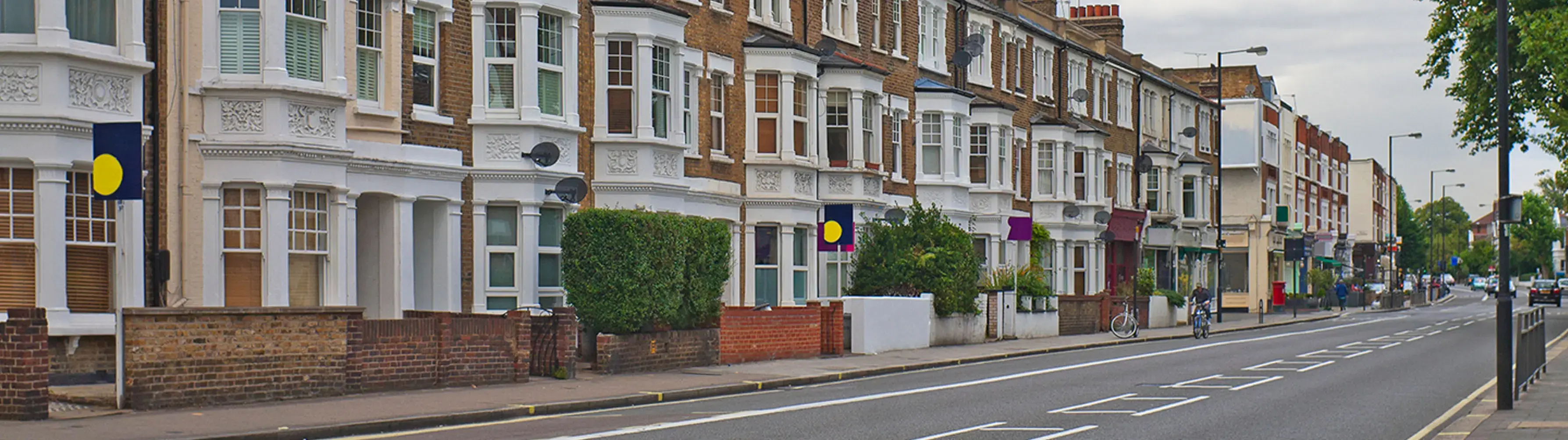 A road of terraced houses on a street in London's Fulham