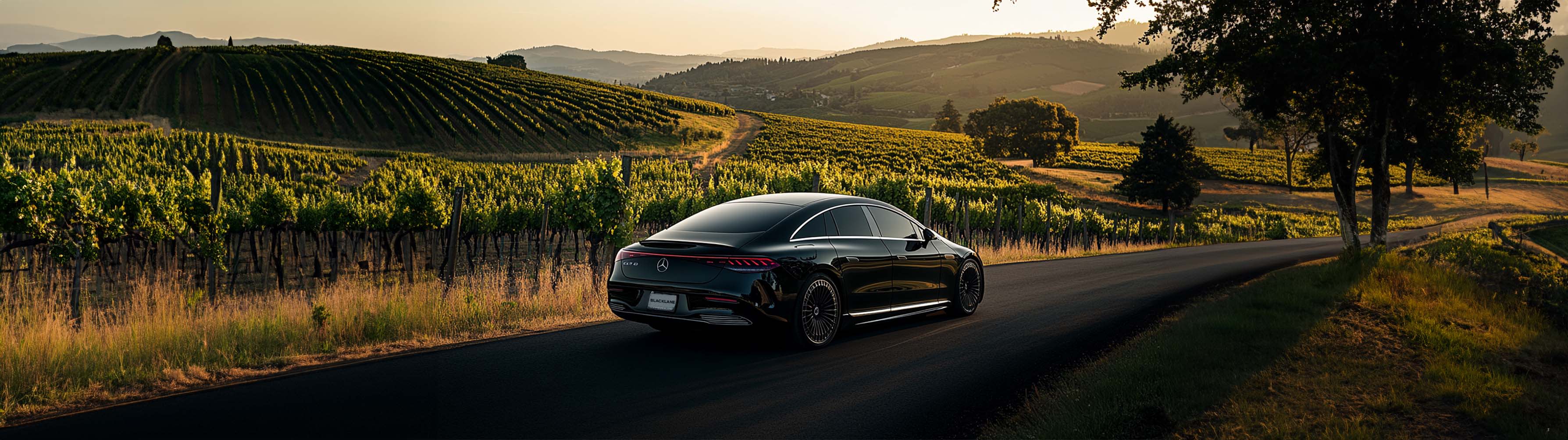 A Blacklane Mercedes limo travels past vineyards from San Francisco to Sonoma.