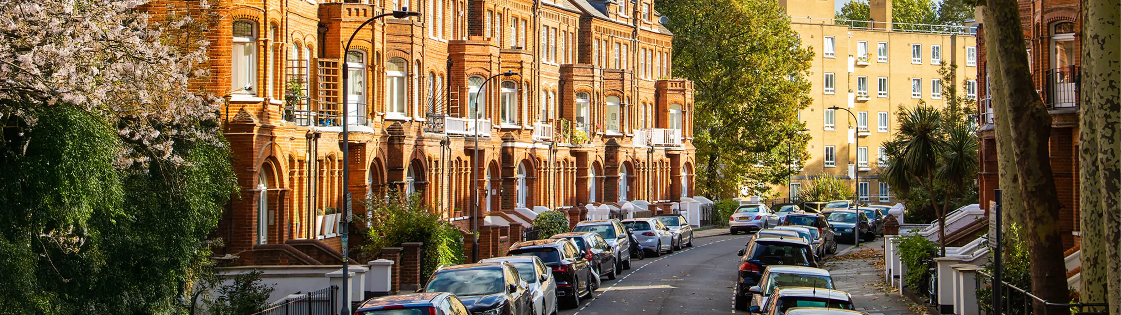 A sunlit street in London's Earl's Court.