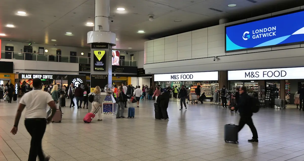 Interior of the South Terminal in Gatwick Airport showing M&S Food and Black Sheep Coffee.