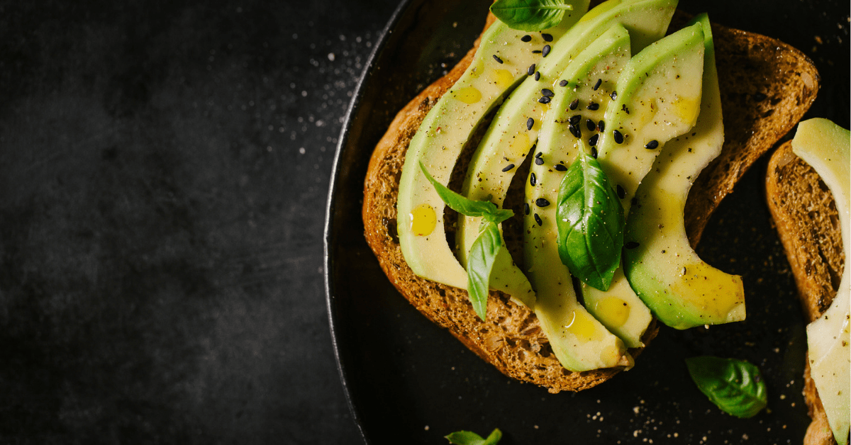 <figcaption class="wp-element-caption">The ever-popular avocado toast can be had at the Admirals Club lounge at LAX. <em>Image credit: nerudol/iStock</em></figcaption>