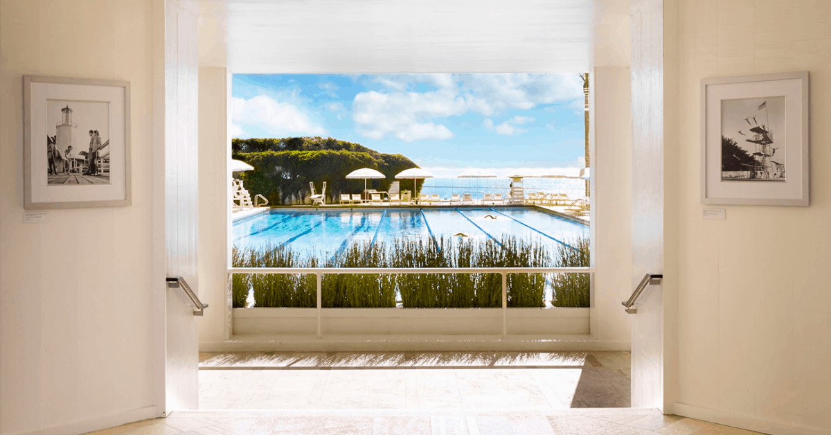 <figcaption class="wp-element-caption">A view out to the on-site pool. <em>Image credit: The Four Seasons Biltmore</em></figcaption>