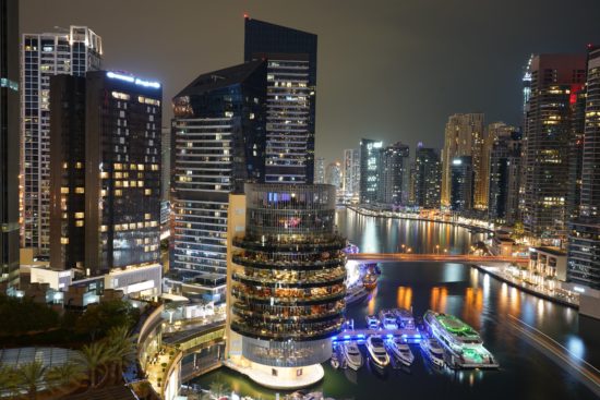 <figcaption class="wp-element-caption">Dubai Marina at night. <em>Image credit: Bruce Kamm/Unsplash</em><br></figcaption>