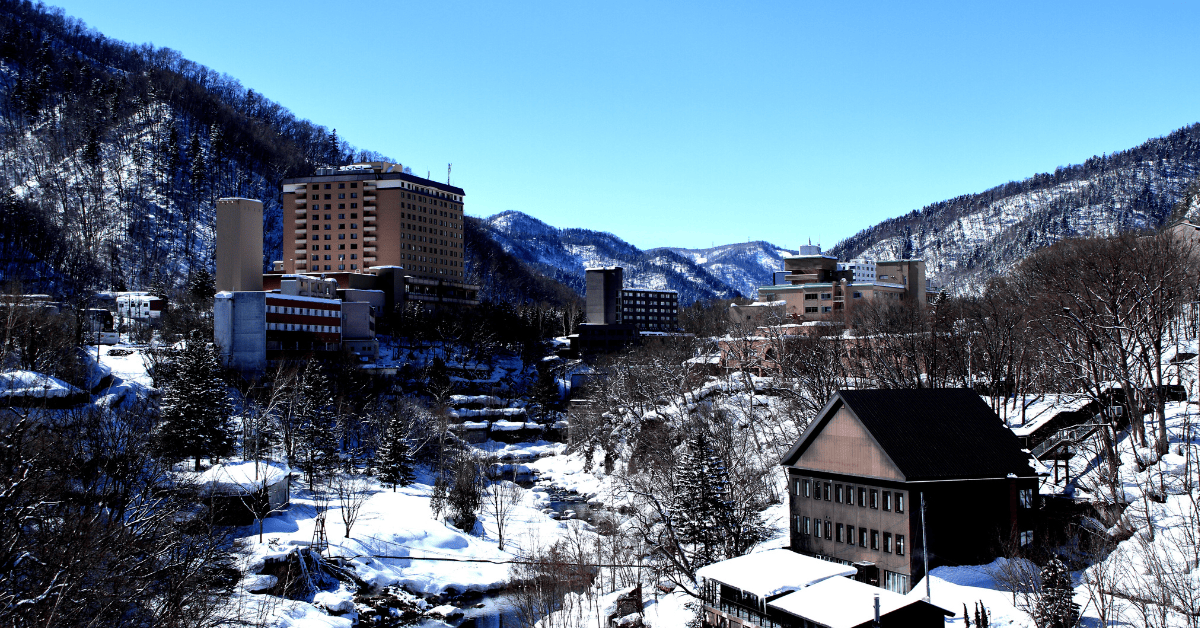 <figcaption class="wp-element-caption">Jozankei is a serene hot-spring resort nestled in a verdant ravine within the Shikotsu-Toya National Park. <em>Image credit: whatever/Getty Images</em></figcaption>