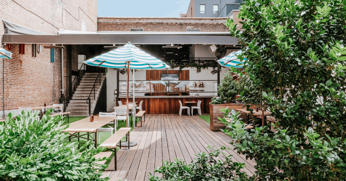 <figcaption>The back patio at Freehold Brooklyn. Image: Courtesy of FREEHOLD Hospitality</figcaption>