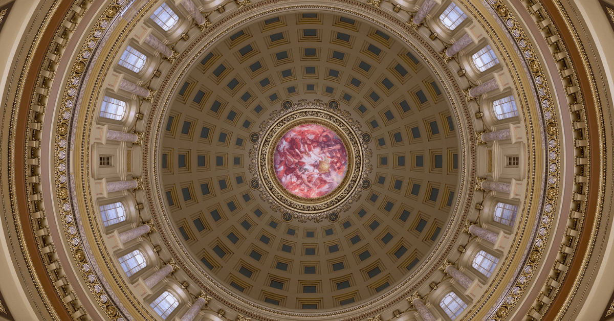 <figcaption>The inner dome of the Wisconsin State Capital building. <em>Image credit gnagel/iStock</em></figcaption>