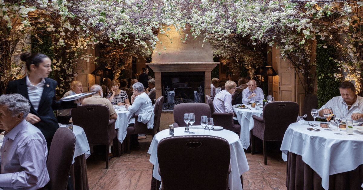 <figcaption class="wp-element-caption">Experience enchantment in the heart of London at Clos Maggiore. <em>Image credit: Clos Maggiore</em></figcaption>