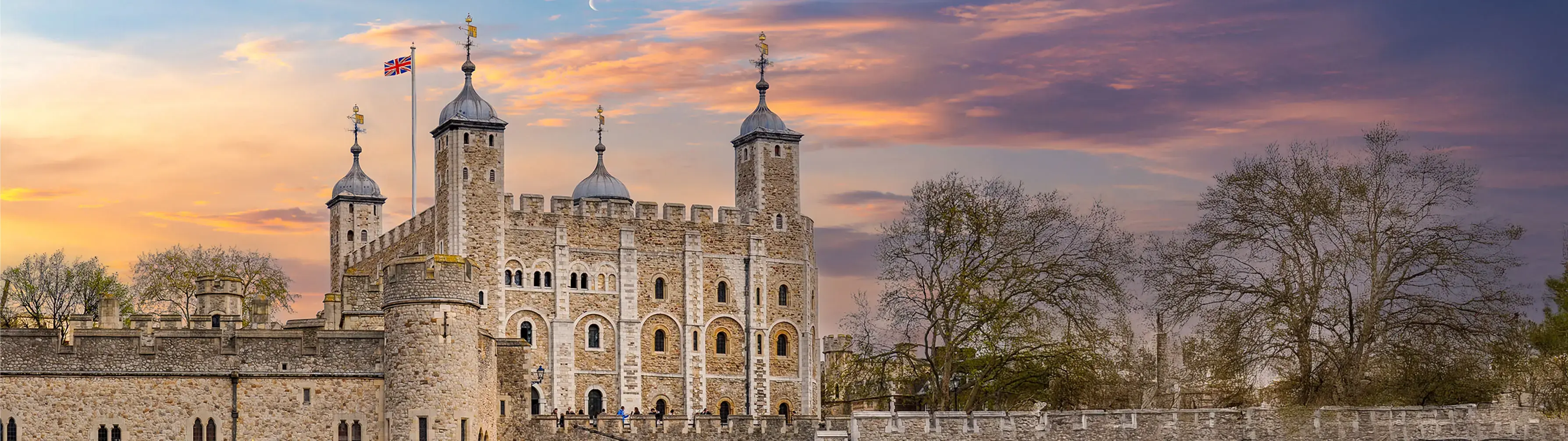 The Tower of London with a sunset behind it.