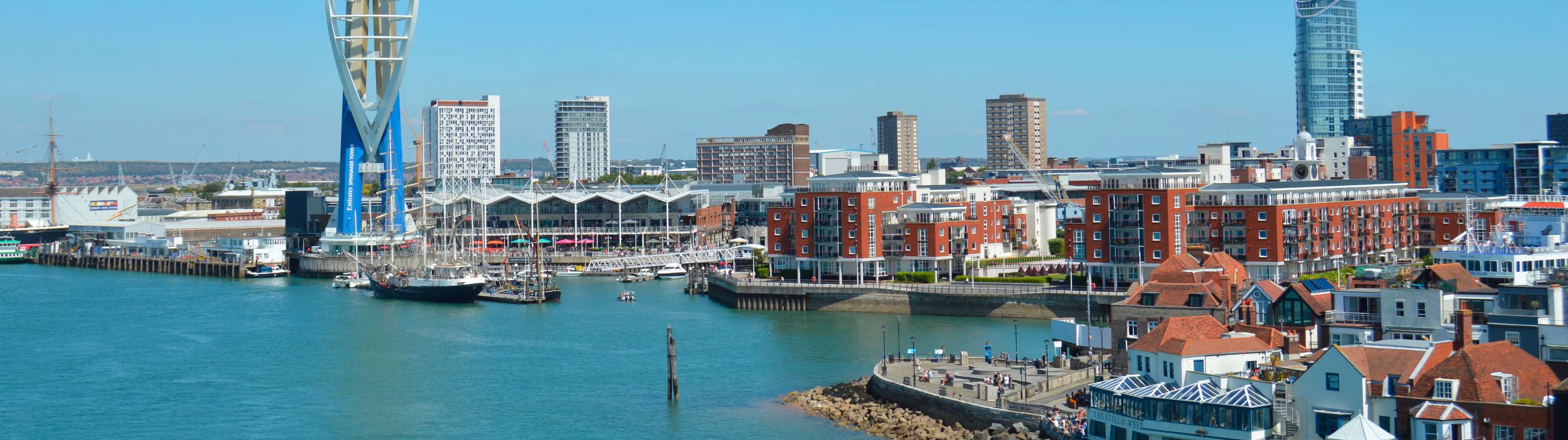 The harbour area of Portsmouth on bright, clear day.
