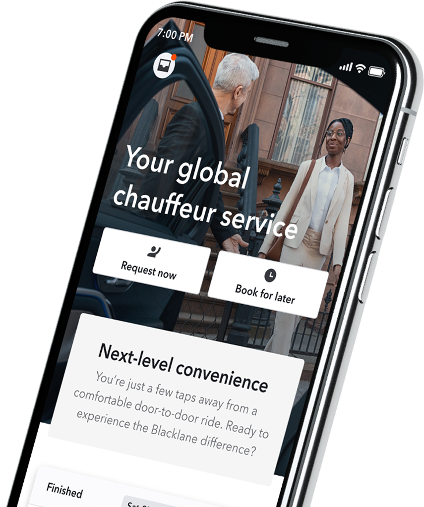 A smartphone showing the Blacklane app’s homescreen which includes a button to book a ride, and the details of an upcoming ride.
