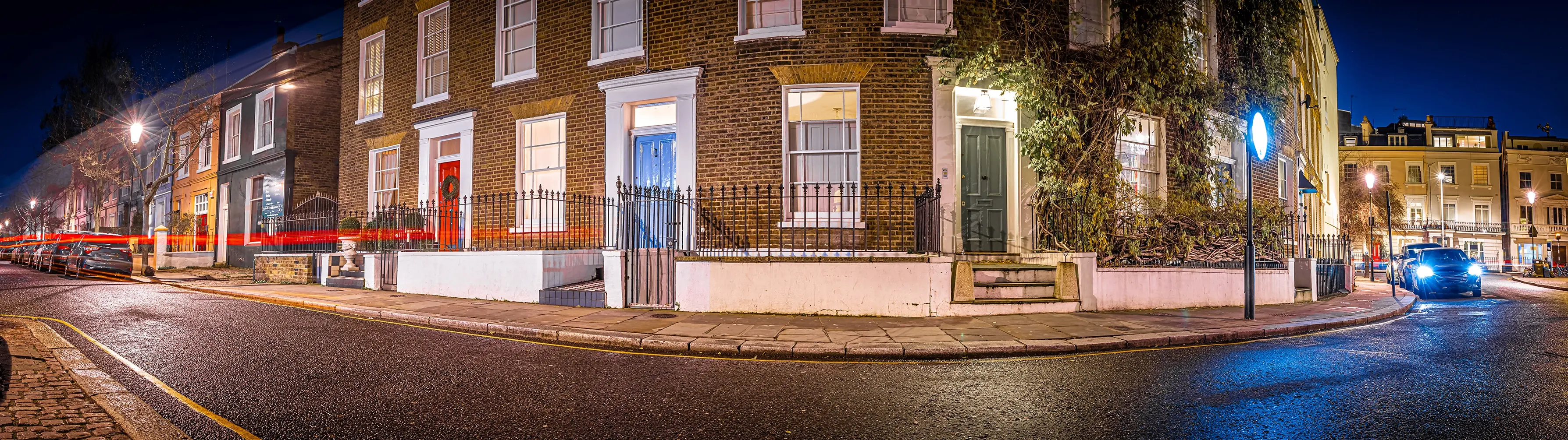 A terraced street in Bloomsbury at night.