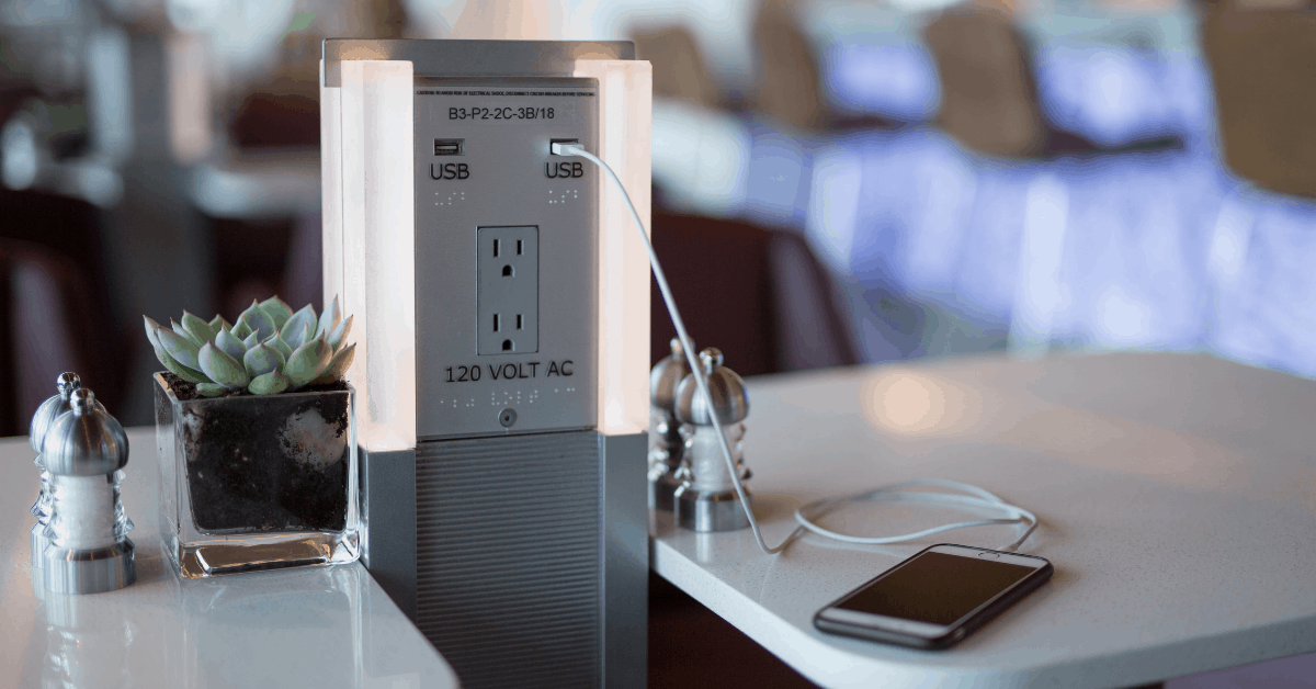 <figcaption>Charge your devices at the Delta Sky Club lounge. <em>Image credit: Delta</em></figcaption>