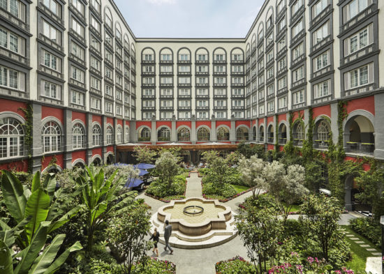 <figcaption class="wp-element-caption">Escape to the serene beauty of the Four Seasons Hotel Mexico City's courtyard oasis, complete with a tranquil fountain and lush greenery. <em>Image credit: Four Seasons Hotel Mexico City</em></figcaption>