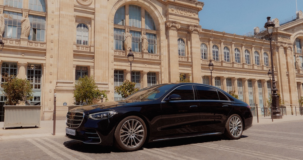 A black Mercedes limo outside Paris's Gare du Nord.