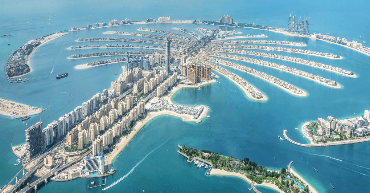 <figcaption class="wp-element-caption">Aerial view of Dubai Palm Jumeirah island, United Arab Emirates. <em>Image credit: Delpixart/iStock</em></figcaption>