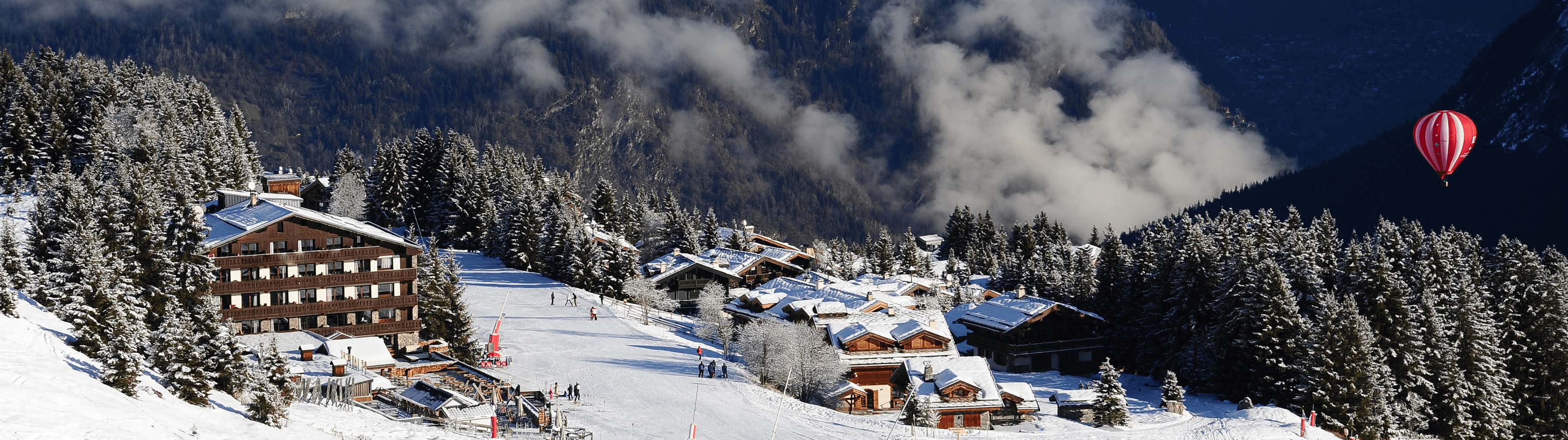 A thick layer of snow covers the white slopes of Courchevel.