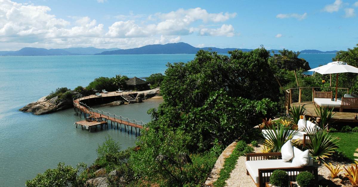 <figcaption> Take time out to unwind with your newly-wed at a beach-side resort.  <em>Image credit: Ponta dos Ganchos</em></figcaption>