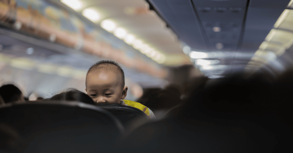 <figcaption class="wp-element-caption">Traveling with kids can be an exciting and memorable experience, especially when it comes to flying on a plane. <em>Image credit: Octav Cado/Unsplash</em></figcaption>