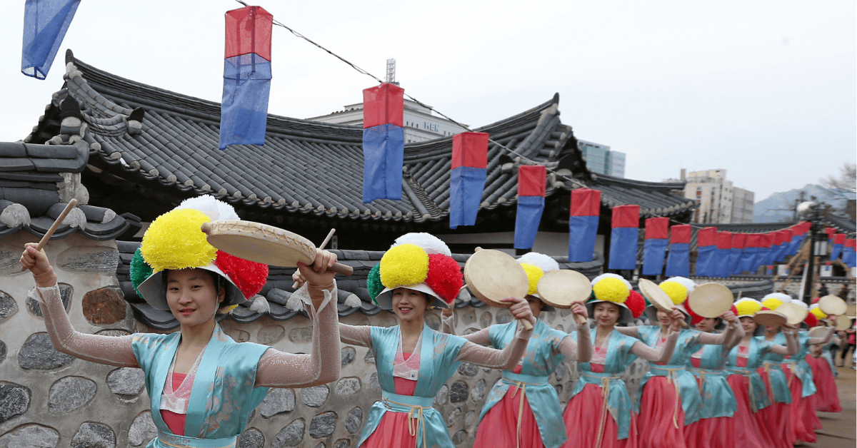 <figcaption class="wp-element-caption">Seollal parade in South Korea. <em>Image credit: Wikimedia</em></figcaption>