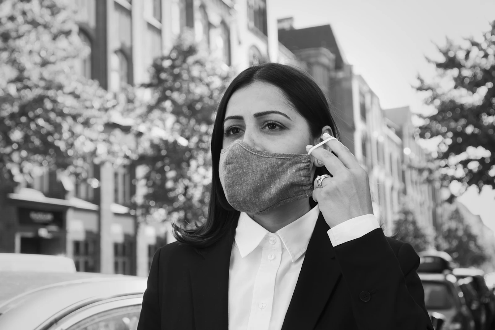 Female chauffeur wearing mask